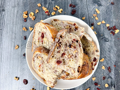 Semi-Exclusive Orange Cranberry Walnut Sourdough on Weathered Wood