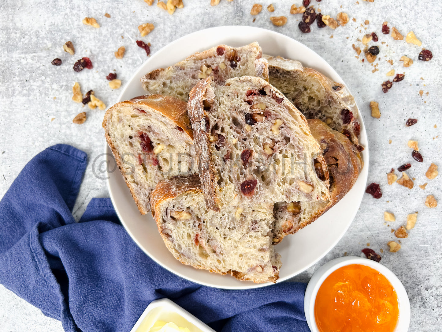 Semi-Exclusive Orange Cranberry Walnut Sourdough on Concrete