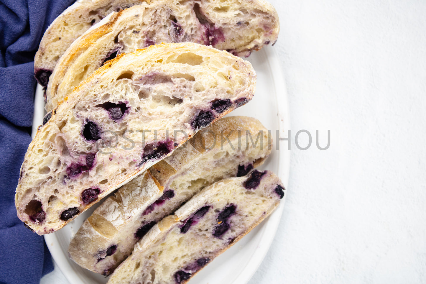 Semi-Exclusive Blueberry Sourdough Bread on Marble